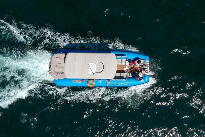 a person riding a wave on a surfboard in the water